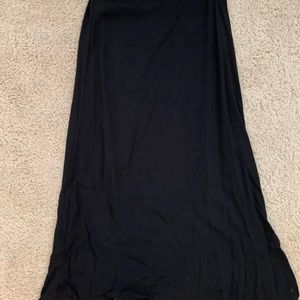 Black flow shin length skirt. Aritzia with tags. Size 4